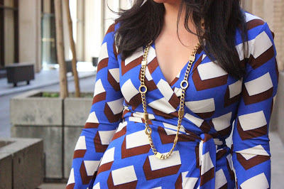 Diane Von Furstenberg Wrap Dress and St. John Necklace