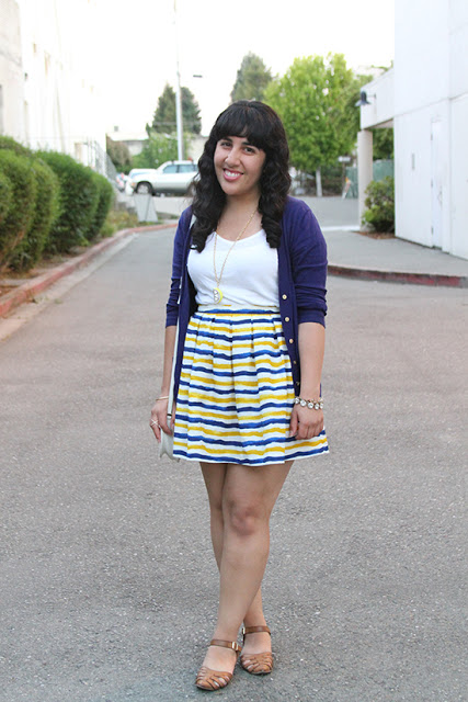 White T-Shirt Styled with a Striped Skirt