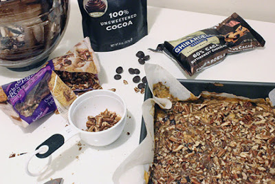 Topping Chocolate Pumpkin Brownies with Chopped Pecans